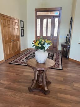 Customer photo from an Etsy review of Solid Walnut Round Dining Table, Pedestal Base