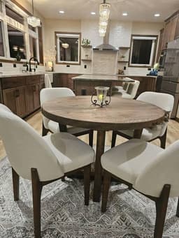 Customer photo from an Etsy review of Solid Walnut Round Dining Table, Pedestal Base