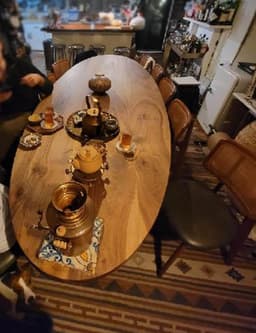 Solid Walnut Oval Dining Table — handmade in our workshop